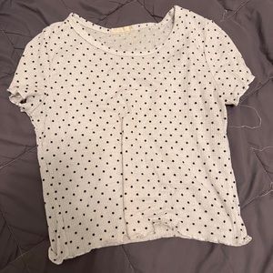 white ruffle shirt with mini black starts